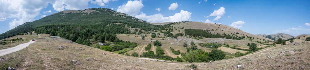 Extra wide angle view of the beautiful mountains and hills of Abruzzo 
