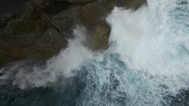Slow motion of wave crashing against the cliffs at the Gap in Albany Western Australia