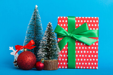 Christmas composition. craft Gift box, small tree, branches and craft DIY decorations on white background. New year concept. Christmas home decoration Flat lay, top view, copy space