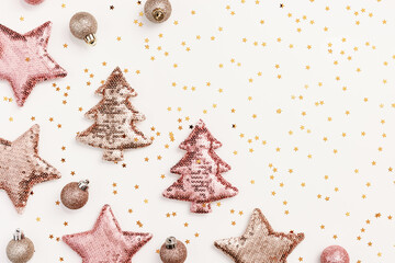Christmas layout with shining Christmas trees, stars, balls, small golden sparkles. New Year...