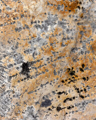 Background texture of orange and grey stone wall in Puglia, Italy