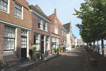 Fototapeta na wymiar Traditional houses in Medemblik in Noord-Holland