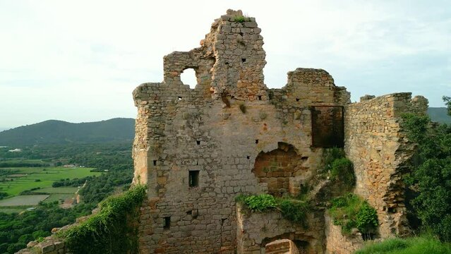 Ruined castle in Europe aerial footage cinematic medieval era  Close-up of a destroyed brick wall palafolls