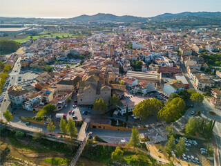Fototapeta na wymiar aerial images of the city of Tordera on the Costa Brava old medieval town on the side of a river