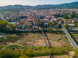 Fototapeta premium aerial images of the city of Tordera on the Costa Brava old medieval town on the side of a river