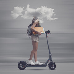 Student with head in a cloud riding a scooter