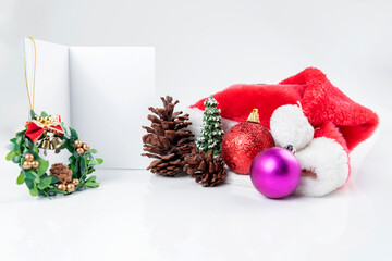 Fototapeta na wymiar Empty paper and a Christmas ornament