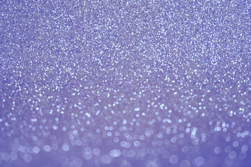 Fototapeta premium Abstract Glitter Background. Violet Texture Sparkling Shiny Paper for Christmas Holiday. Seasonal Wallpaper Decoration. Greeting and Wedding Invitation Card Design. Sparkle Lights and Bokeh Backdrop.