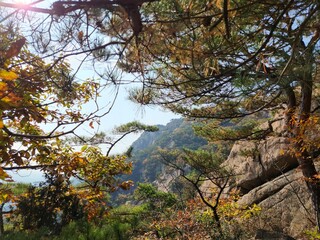 Fototapeta premium Bukhansan National Park. Bukhansan Bibong Peak - Hyangnobong Peak. autumn mountains. hiking Korean mountains. mountain landscapes in autumn. trekking. rise to the top of the mountain.