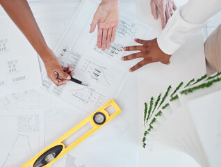 Architect, hands and construction planning for building industry in team discussion or meeting on the table. Hand of business people in architecture or industrial design for project or model plan