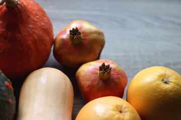 Various healthy autumnal food on wooden table. Selective focus.