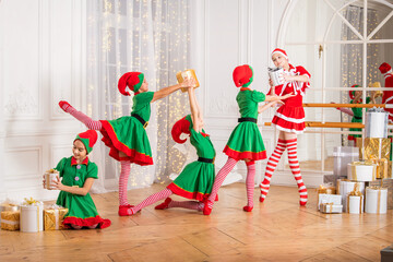 A group of cheerful happy children girls girlfriends students of a professional choreographic...