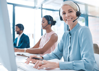 Portrait of a senior customer support, receptionist or call center agent working online with...