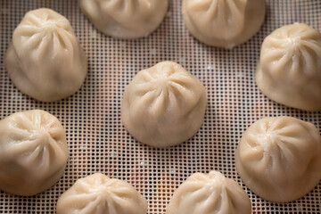 Steamed pork soup dumplings named Xiao long bao in Taiwan.