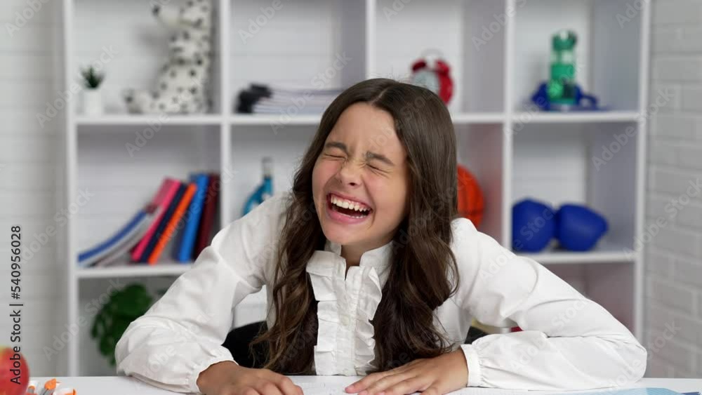 Canvas Prints happy kid laughing at funny joke in classroom, joke