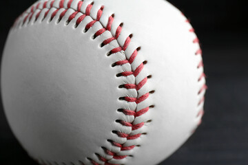 Baseball ball on black background, closeup. Sports game