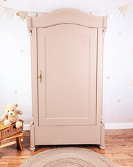 Wardrobe after renovation painted in beige color