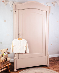 Wardrobe after renovation painted in beige color