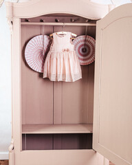 Wardrobe after renovation painted in beige color