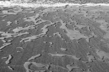 waves on sand