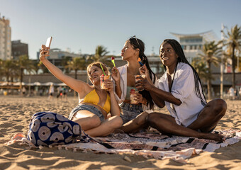 Woman having fun at sunset on tropical beach and taking selfie