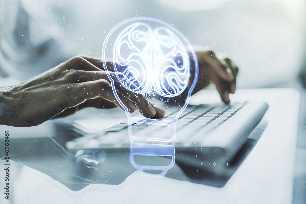 Poster creative light bulb with human brain hologram and with hands typing on computer keyboard on backgrou