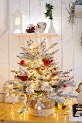 beautiful white tree in the christmas kitchen