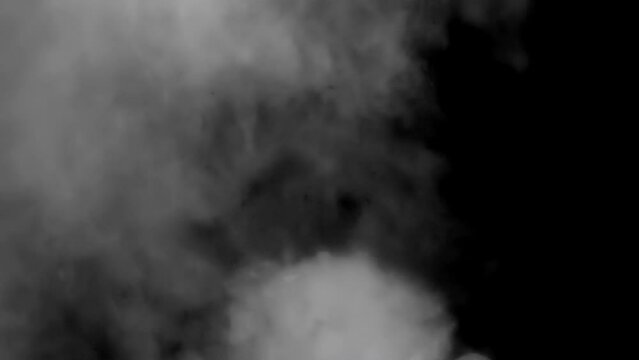 Abstract 4k smoke background: grey steam shapes, rising like clouds from a pipe, studio shot. Can be added to existing footage via overlay or screen channel.
