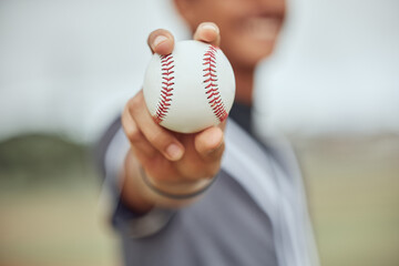 Athlete with baseball in hand, man holding ball on outdoor sports field or pitch in New York...