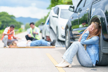 An injured woman in a plastic stretcher after a car accident ,Car accident insurance concept