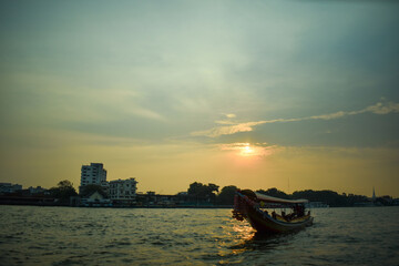 The sunset sea view of Thailand with a boat