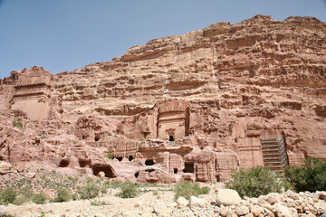 Petra, Jordan, November 2019 - A large stone building with Petra in the background