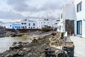 Picturesque Punta Mujeres with white architecture and natural pools, Lanzarote, Canary Islands, Spain