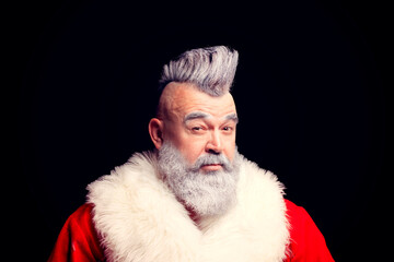 Evil aggressive gray-haired old man Santa in a bad mood. New Year and Christmas in the company of...