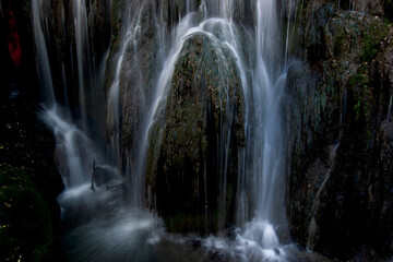 Fototapeta na wymiar waterfall in the forest, waterfall in the park,