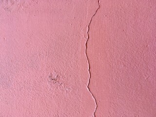 Obraz premium Pink crack wall background