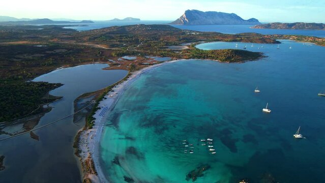 Italy. Sardegnia island nature scenery and best beaches. Aerial drone video of stunning La Cinta beach (San Teodoro) with turquoise sea and sault lake