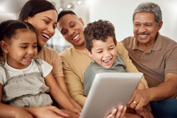 Parents, children and grandfather with tablet on sofa in house or family home living room for zoom...