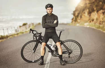Foto op Aluminium Man, cycling and mountain bike with arms crossed for sports exercise, training and fitness in nature. Portrait of a confident male professional cyclist standing by a bike for cycle tour outdoors © Beaunitta V W/peopleimages.com