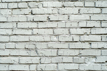 Wall of white bricks. Background with wall painted with white paint.