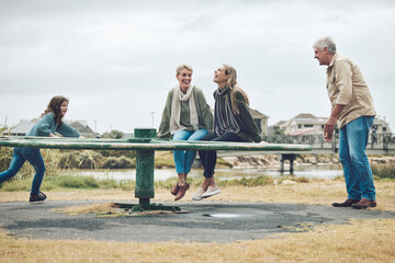 Playground, family and happy people in a nature play park with a mom, child and grandparents. Mother with children feeling happiness, love and kid care outdoor with a smile laughing together