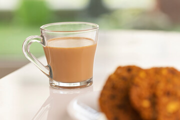 Indian Snack Peas Masal Vada, deep fried snacks food with cup of tea.
