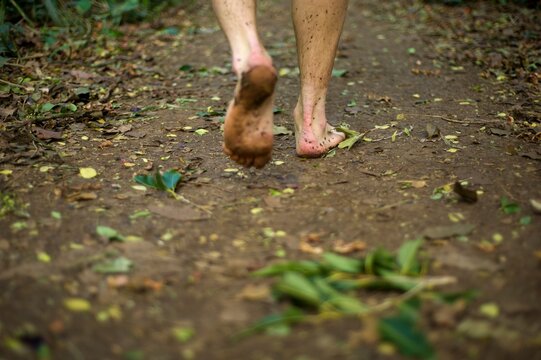 Walking down trail barefoot