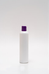 Mock-up white cosmetic bottle