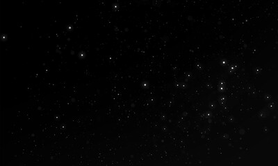 Fototapeta premium blurred sparks from fire in front of black backgound