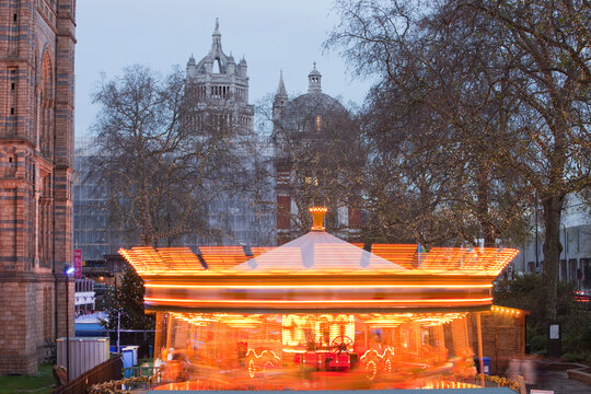 A fairground ride outside the Natural History Museum in London, UK.