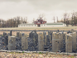 Black basalt steles and gate building with watchtower at concentration camp, KZ Buchenwald", Ettersberg, Weimar, Thüringen, Germany