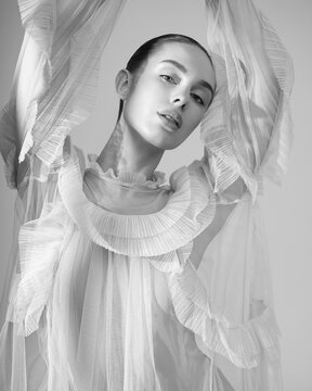 Sexy model in transparent dress.
