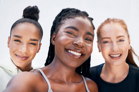 Friends, selfie and fitness women relax after training, sports and exercise against a white background. Diversity, face and lady portrait after workout session, happy, cheerful and smiling for photo