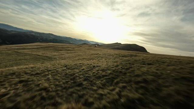 Aerial FPV View of Camper Van on Montenegrin mountains near Kolasin